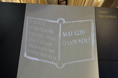 Projection of a quote "O MOST WRETCHED MOUSE, THOU DOST EVER PROVOKE ME UNTO WRATH. MAY GOD DAMN YOU!"