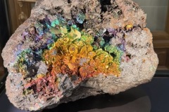 Hematite stone in the Mineral Exhibition, in striking rainbow colours.