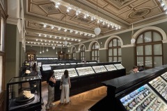 View over rows and rows of exhibition cases of mineral samples.
